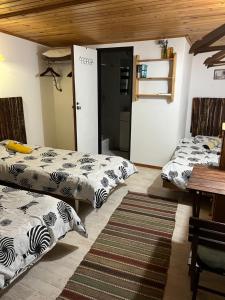 Postel nebo postele na pokoji v ubytování Mikulas Guest House