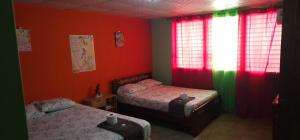 Postel nebo postele na pokoji v ubytování Cuartos independientes con baño privado - Casa La Dolce Vita Las Tablas