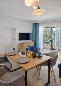 TV a/nebo společenská místnost v ubytování Horizon Park Apartament 26 "Mexicano"