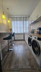 Kuhinja ili čajna kuhinja u objektu Central View Apartment