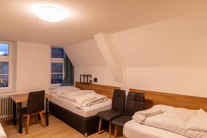 Postel nebo postele na pokoji v ubytování Brauhaus-Hotel König von Flandern