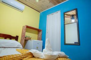 Cama ou camas em um quarto em Pousada Canto da Sereia