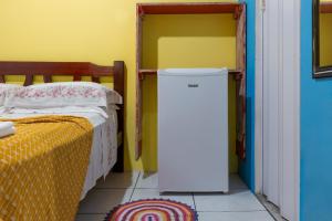 Cama ou camas em um quarto em Pousada Canto da Sereia