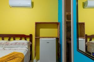Cama ou camas em um quarto em Pousada Canto da Sereia