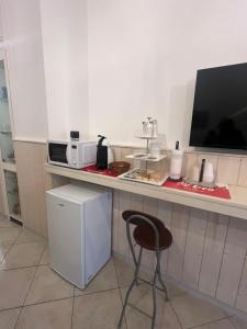 Kuchyň nebo kuchyňský kout v ubytování Il Pulo Guest House + 3 fotografie