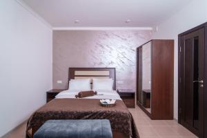 Voodi või voodid majutusasutuse Visota 1880 Hotel Tsaghkadzor toas