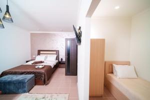 Voodi või voodid majutusasutuse Visota 1880 Hotel Tsaghkadzor toas