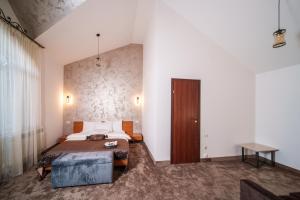 Voodi või voodid majutusasutuse Visota 1880 Hotel Tsaghkadzor toas