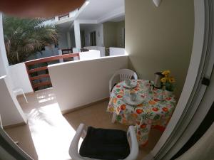 a balcony with a table and chairs in a room at sweet home B4 in Sal Rei