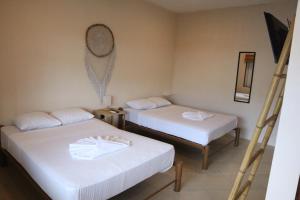 Postel nebo postele na pokoji v ubytování 3B Wellness Hotel & Hostel Adults Only