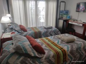 Ένα ή περισσότερα κρεβάτια σε δωμάτιο στο Buenos Aires, Las Toscaneras