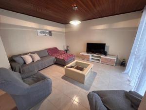 Χώρος καθιστικού στο A Casa da Minha Mãe