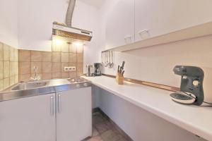 Kuchyň nebo kuchyňský kout v ubytování Hotel Hülsmann Garni + 37 fotografií