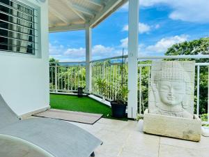 Balkón nebo terasa v ubytování Sun7 Appart T1, avec piscine partagée, vue panoramique sur la nature