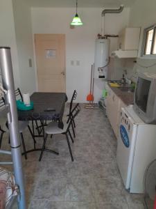 Una cocina o kitchenette en Departamentos Niñas