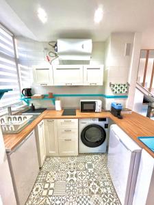 Kuchyň nebo kuchyňský kout v ubytování Duplex Haven