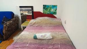 Postel nebo postele na pokoji v ubytování Rosewood Balkan Cottage