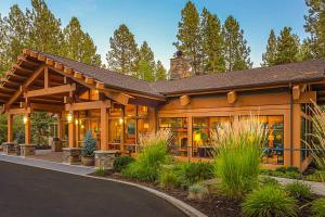 a large wooden house with a lot of windows at Seventh Mountain Resort Unit 1913 in Bend
