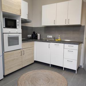 Kuchyň nebo kuchyňský kout v ubytování BOBANO Apartman + 5 fotografií