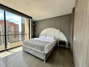 Postel nebo postele na pokoji v ubytování Loft estilo Japonés + 37 fotografií
