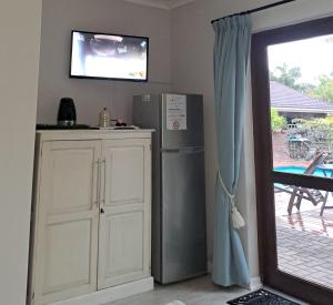 TV a/nebo společenská místnost v ubytování Plettenberg Bay 7 BUNKER AVENUE