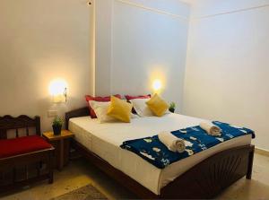 Voodi või voodid majutusasutuse The Bodhi Tree Resort toas