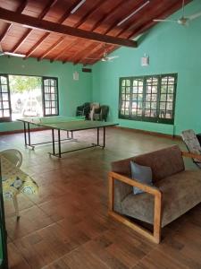 Posezení v ubytování Tupasy Marangatu Hostal