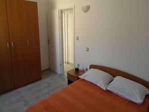 Postel nebo postele na pokoji v ubytování Apartments Marietta