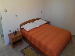 Postel nebo postele na pokoji v ubytování Apartments Marietta