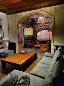 Posezení v ubytování Le Pavillon de l'Intemporelle Bagnères de Bigorre
