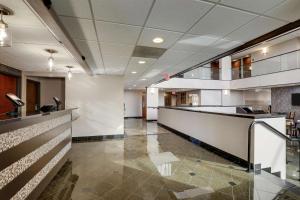 a lobby of a hospital with a reception desk at Drury Inn & Suites Springfield in Springfield +37 photos