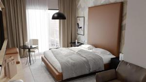 Ένα ή περισσότερα κρεβάτια σε δωμάτιο στο Trius Hotel +39 φωτογραφίες