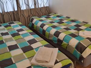 Katil atau katil-katil dalam bilik di apartment hotel
