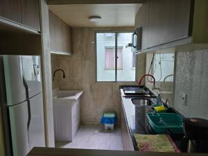 Galeriebild der Unterkunft APARTAMENTO MOBILIADO NO 4º ANDAR bloco M com garagem in São Borja + 6 Fotos