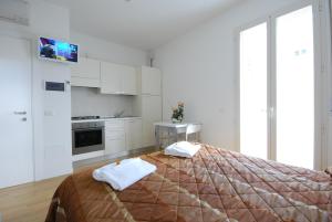 Postel nebo postele na pokoji v ubytování Amadei Hotel Figaro & Apartments