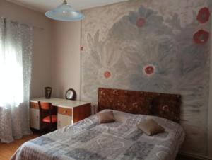 Postel nebo postele na pokoji v ubytování Kolhida home