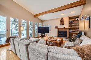 a living room with a couch and a tv at 2997 Basingdale home in Vail