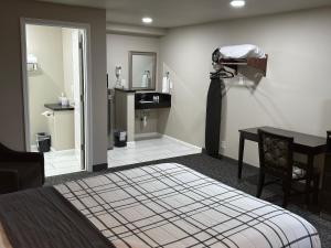 Kuchyň nebo kuchyňský kout v ubytování Royal Inn Eugene- Airport