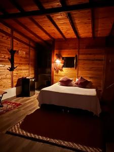 Postel nebo postele na pokoji v ubytování Cabaña Los Calima Green Soul