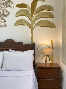 Postel nebo postele na pokoji v ubytování Casa Coco Verde Paraty