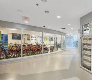 a store aisle with a bunch of bikes at Luxury - Ocean front - 3 Bedroom 2 Bathroom - Penthouse in Miami Beach