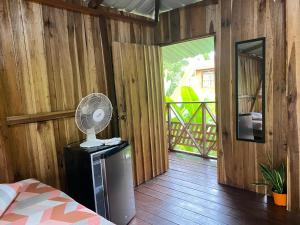 Postel nebo postele na pokoji v ubytování Hotel cahuita
