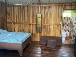 Postel nebo postele na pokoji v ubytování Hotel cahuita