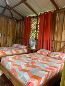 Postel nebo postele na pokoji v ubytování Hotel cahuita + 37 fotografií