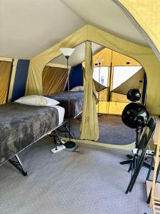 Postel nebo postele na pokoji v ubytování Mycow Accommodation Mackay