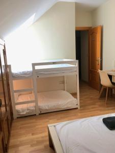 Postel nebo postele na pokoji v ubytování Aposentos AOVE On Tour