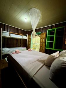 Katil atau katil-katil dalam bilik di Madre Selva Hostel
