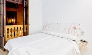 Postel nebo postele na pokoji v ubytování AMC Granada