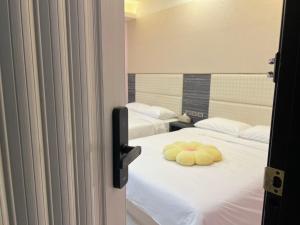 哈佛轻旅客房内的一张或多张床位