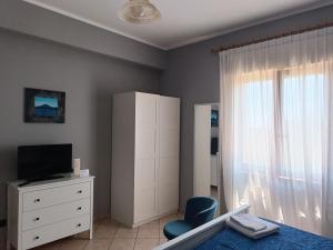 TV a/nebo společenská místnost v ubytování B&B Bellavista Gerace